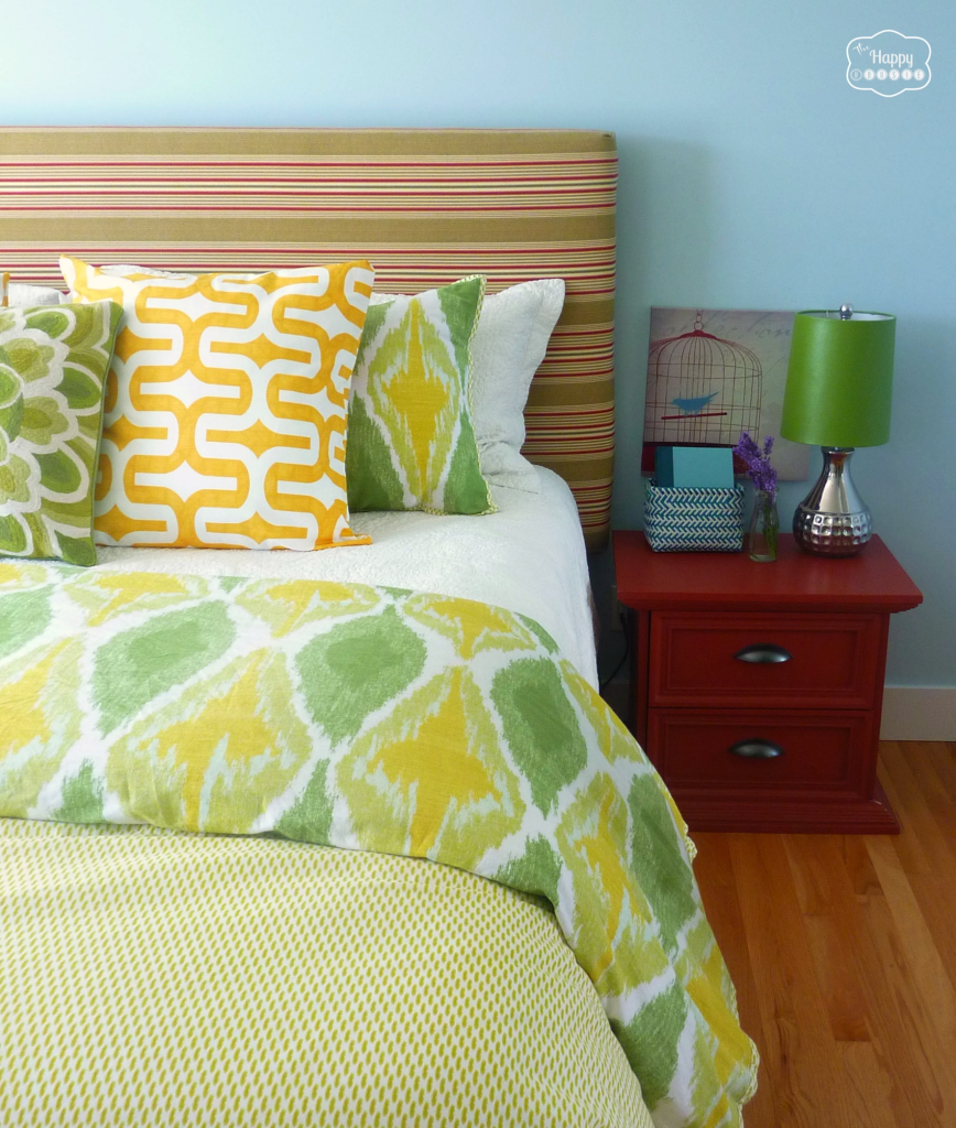 master bedroom for summer bed with mixed pattern bedding and large envelope cushions at thehappyhousie
