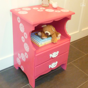 coral pink nightstand with sweeping stenciled flowers thumbnail at thehappyhousie
