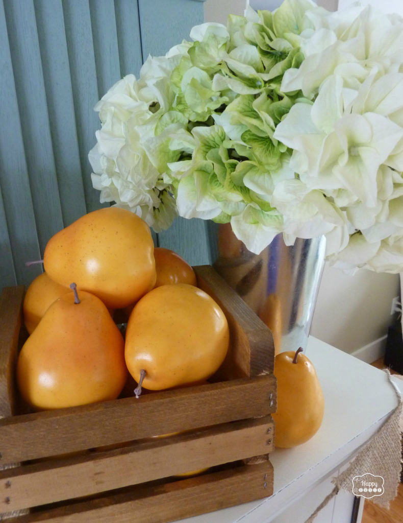 crate of pears and bucket of hydrangeas for early fall mantel at thehappyhousie