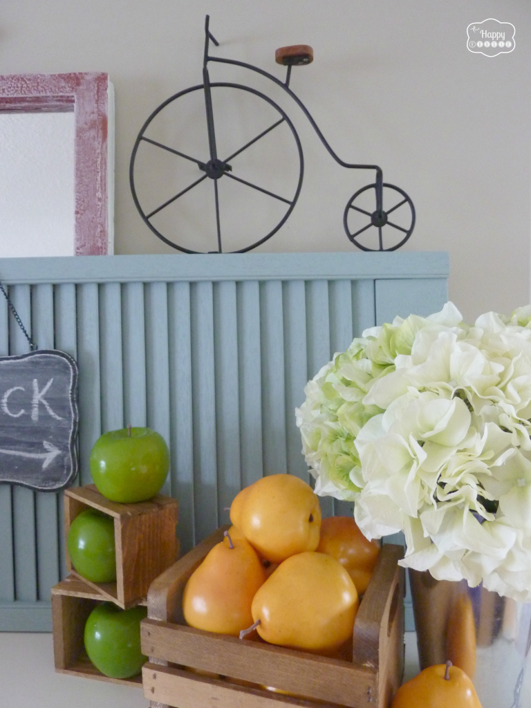 early fall harvest mantel with apples pears in a crate hydrangeas faux chalkboard bicycle at thehappyhousie