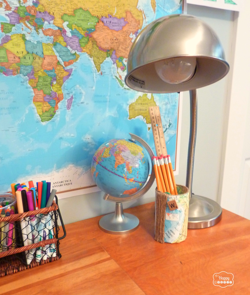 upcycled thrifted homework station with vintage school desk globes and map at thehappyhousie