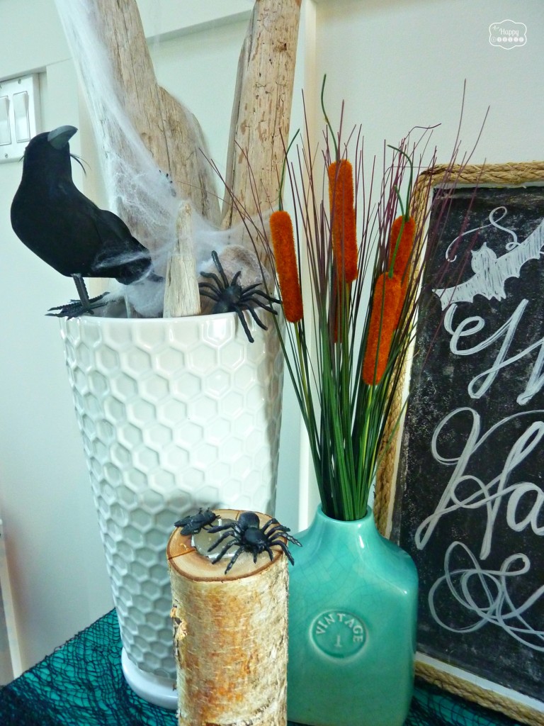 Halloween House Tour entry hall vignette with crows and spiders at thehappyhousie