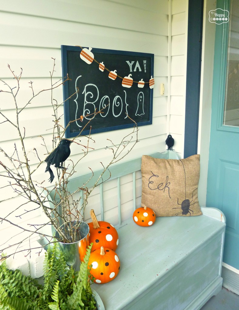 Halloween front porch with polka dot pumpkins crows chalkboard art at thehappyhousie