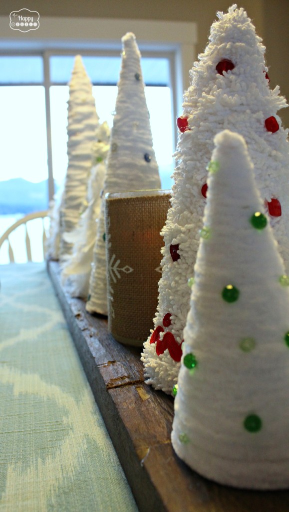 DIY Mini Christmas Tree centerpiece on reclaimed wood board at thehappyhousie