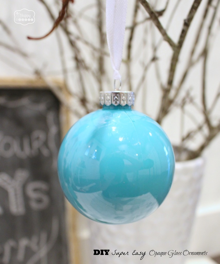DIY Super Easy Opaque Glass Ornaments hanging on the tree.