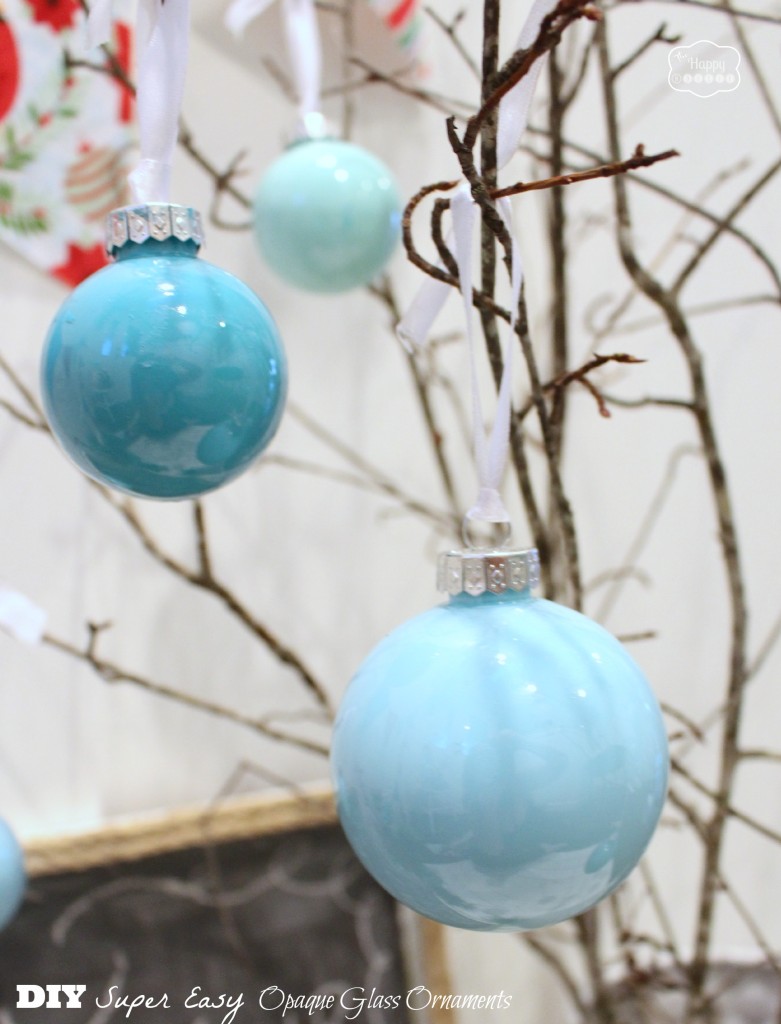 The blue ornaments on a twig tree.