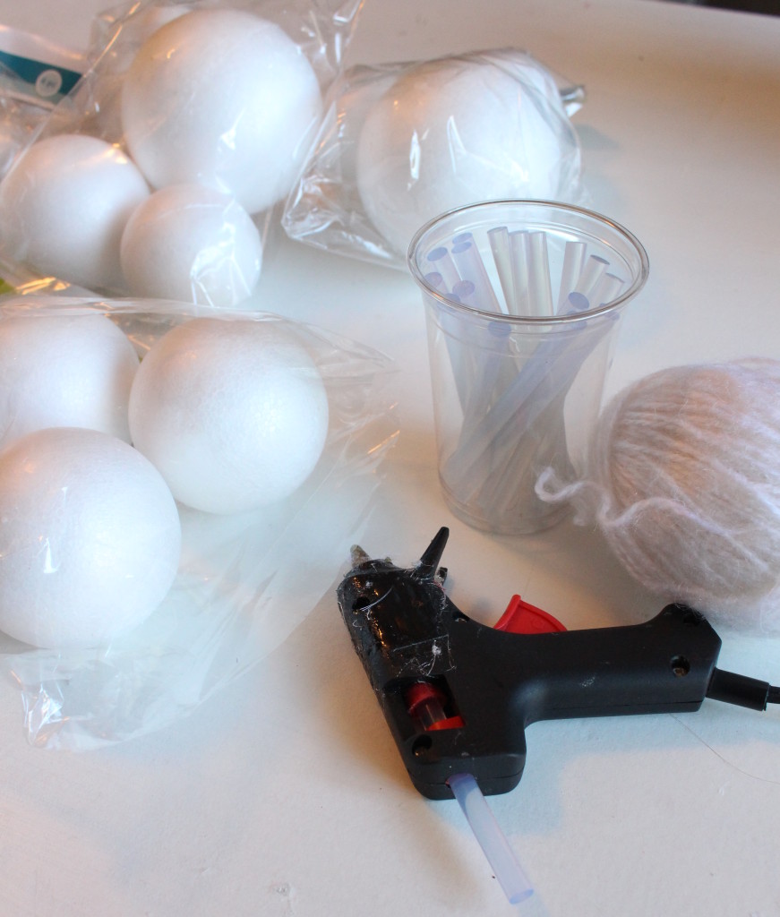 Balls of styrofoam, yarn and a hot glue gun.