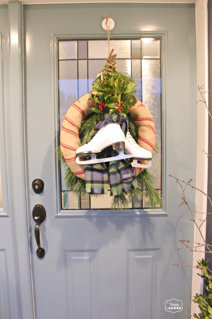 The wreath hanging on the front door.