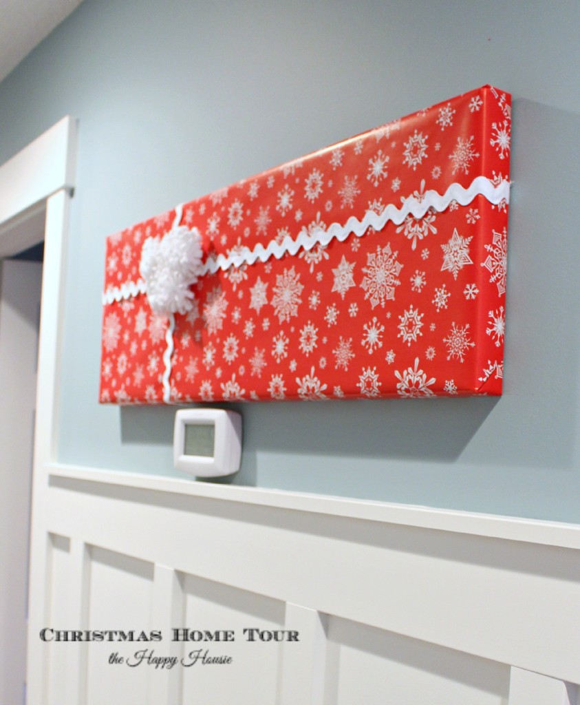 The Happy Housie Christmas Home Tour wrapped gift in hallway