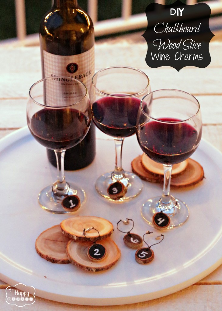 Glasses with red wine and the charms around them.