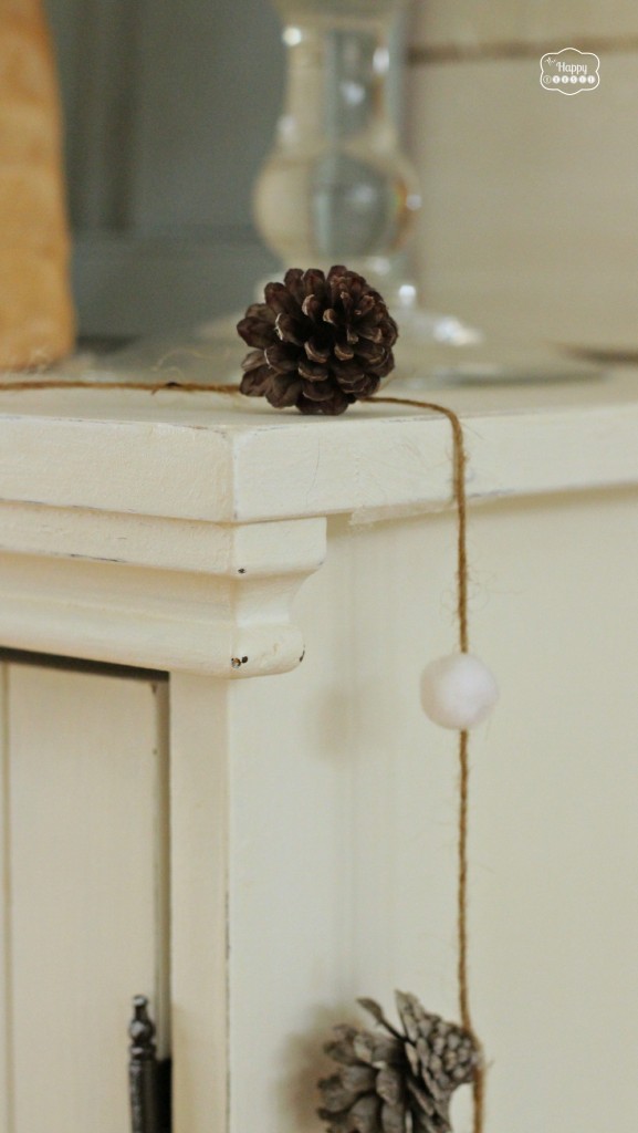 Pompom Pine Cone Garland for January Blue Winter Mantel The Happy Housie