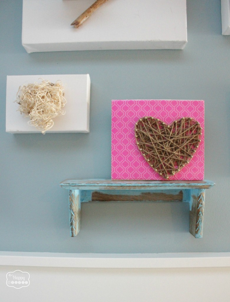 Rustic Glam Heart String Art in entry on a small shelf.