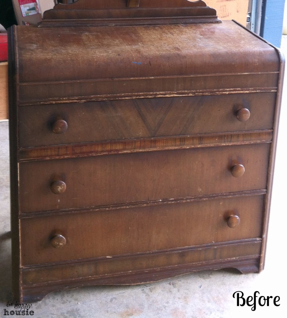 A worn old brown dresser before the makeover.