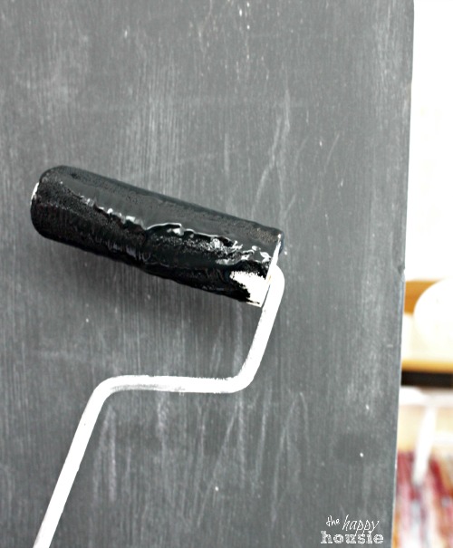 DIY Chalkboard Paint for Pantry Doors apply with a foam roller at The Happy Housie