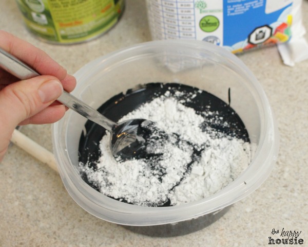 DIY Chalkboard Paint for Pantry Doors mixing grout into paint at The Happy Housie
