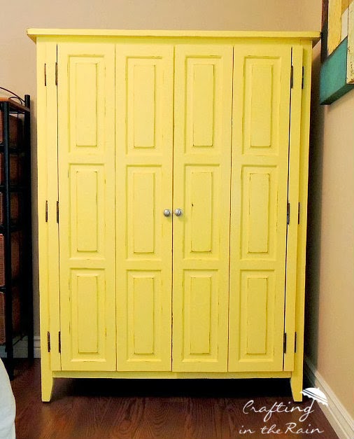 painted-yellow-entertainment-center