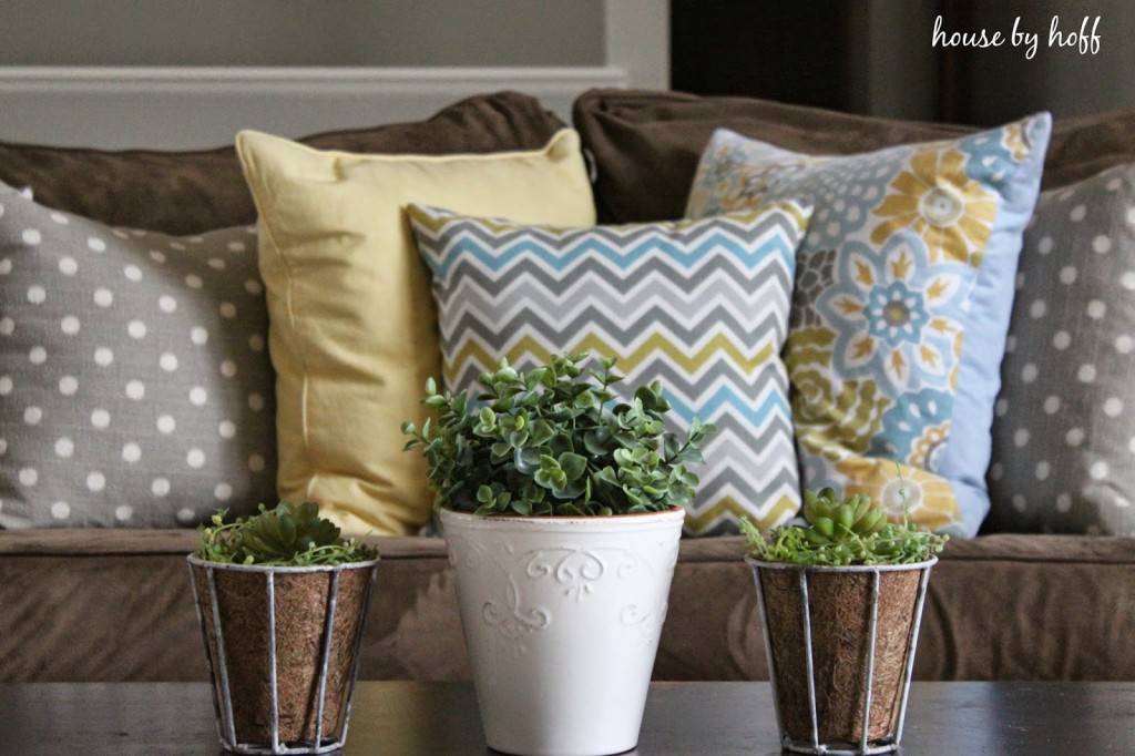 House by Hoff pillows in yellow, gray and floral.