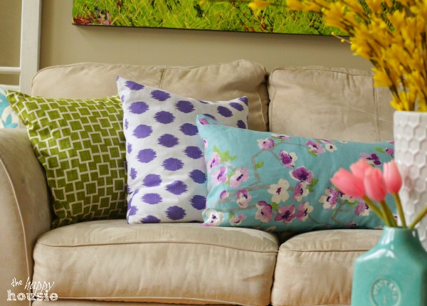 Floral pillows on a couch.