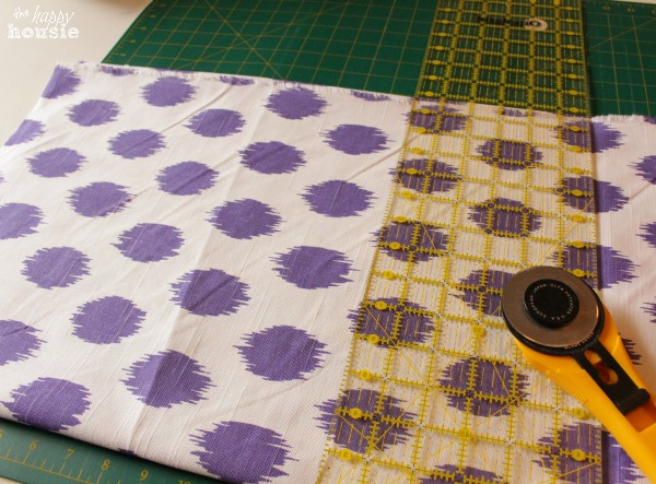 Simple Stunning DIY Envelope Pillow Tutorial cutting fabric at The Happy Housie