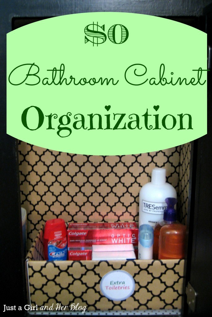 Bathroom-Cabinet-Organization with toothpaste, shampoo and conditioner.