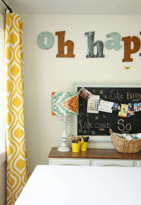 I love this colorful organized craft room makeover at thehappyhousie.com-29