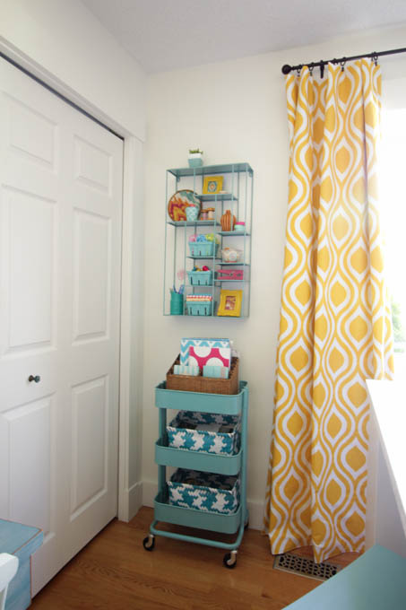 I love this colorful organized craft room makeover at thehappyhousie.com-32