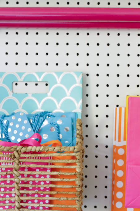 I love this colorful organized craft room makeover at thehappyhousie.com-41