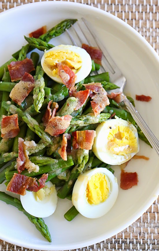 asparagus egg and bacon salad on the table.