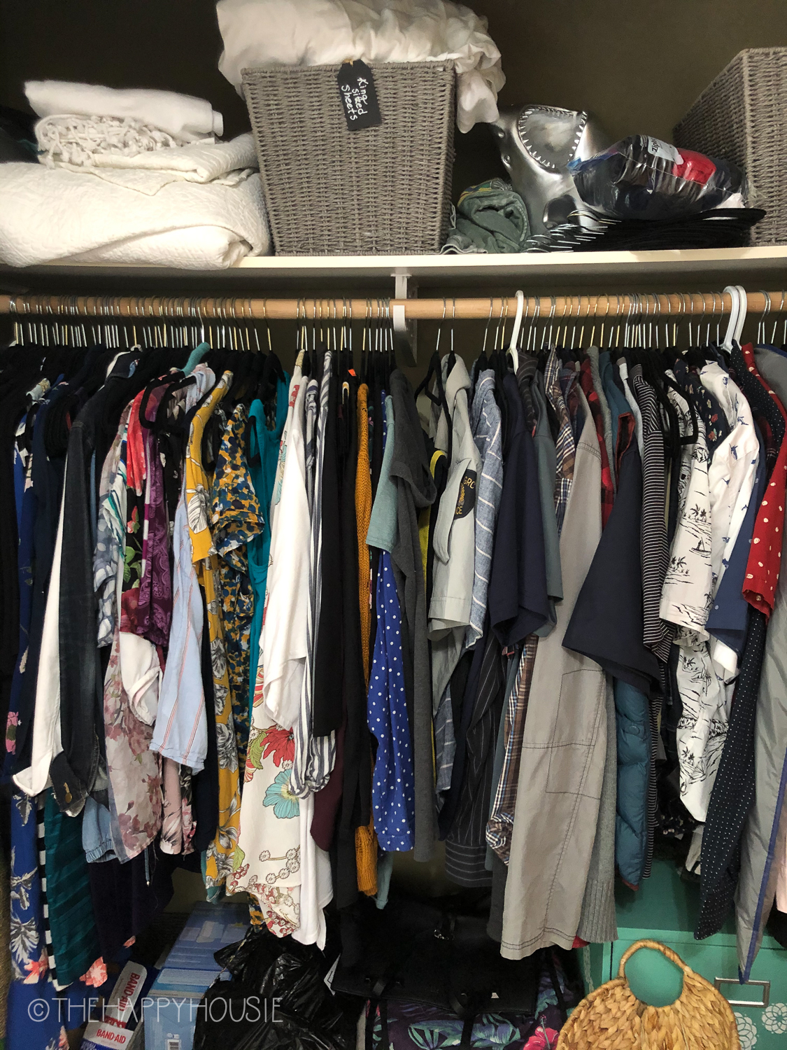 https://www.thehappyhousie.com/wp-content/uploads/2020/08/how-to-organize-a-small-reach-in-closet-for-multi-purpose-storage-09.jpg