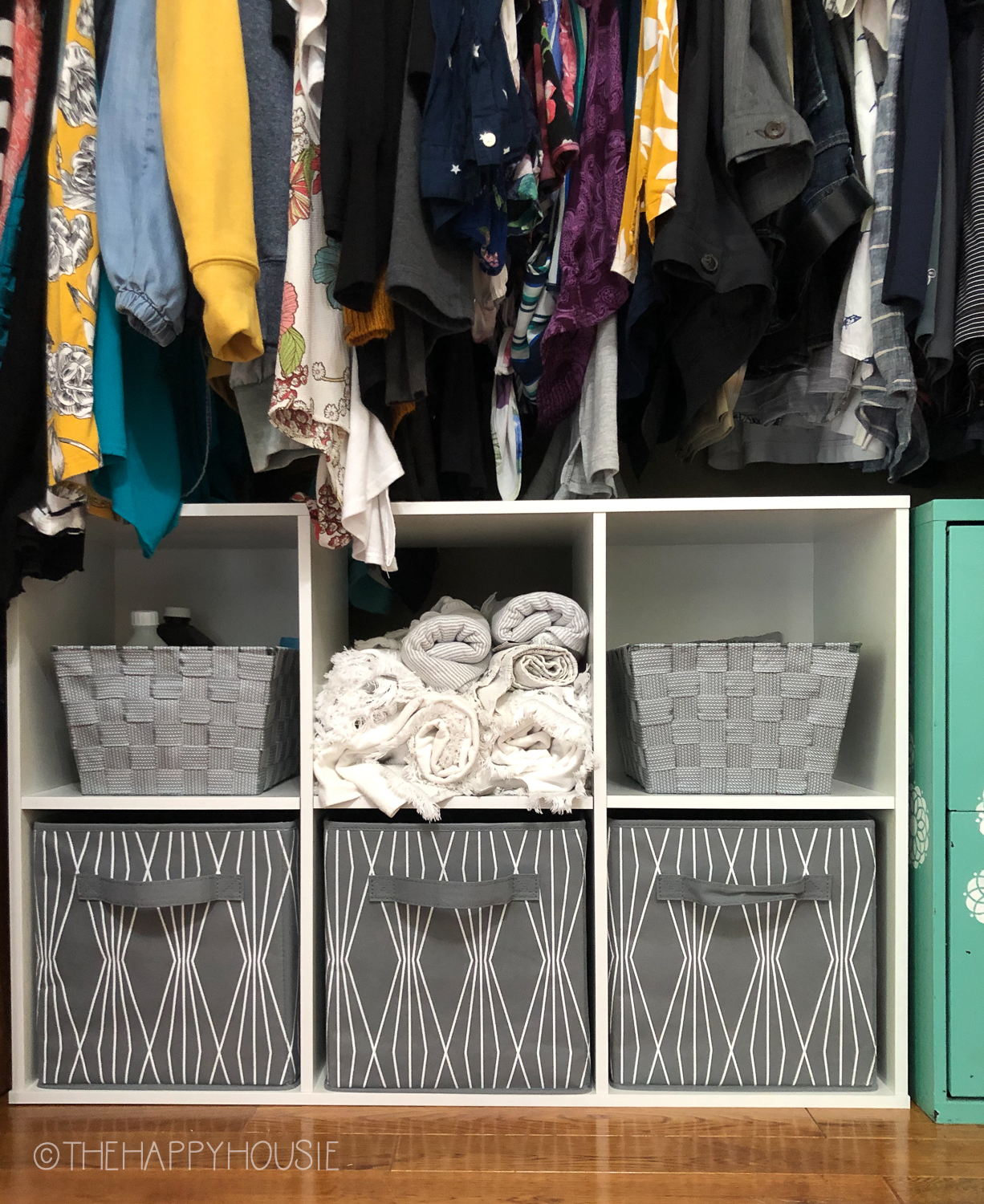 https://www.thehappyhousie.com/wp-content/uploads/2020/08/how-to-organize-a-small-reach-in-closet-for-multi-purpose-storage-4.jpg