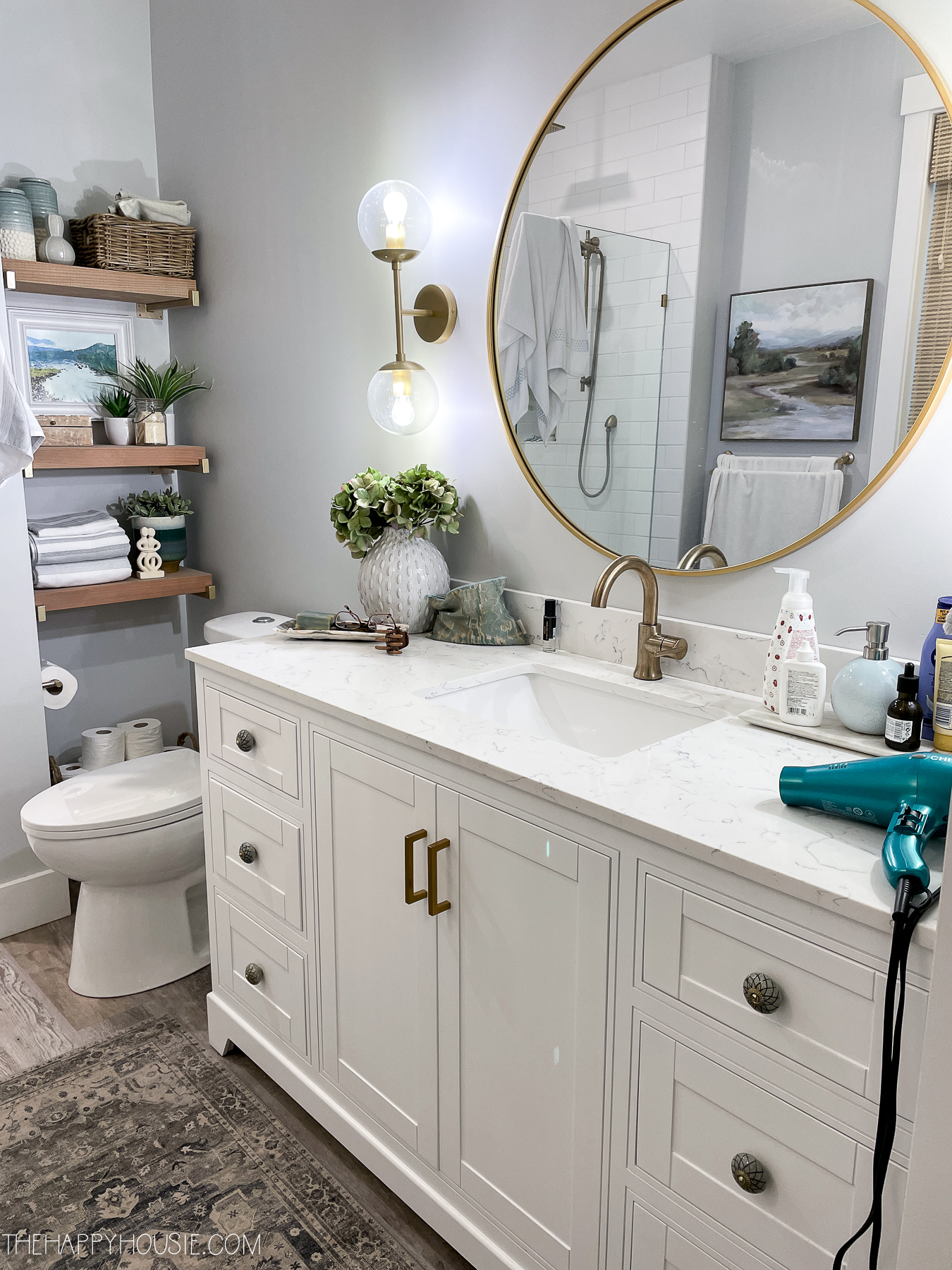 https://www.thehappyhousie.com/wp-content/uploads/2022/01/bathroom-cabinet-organization-ideas-and-how-to-organize-your-bathroom-1.jpg